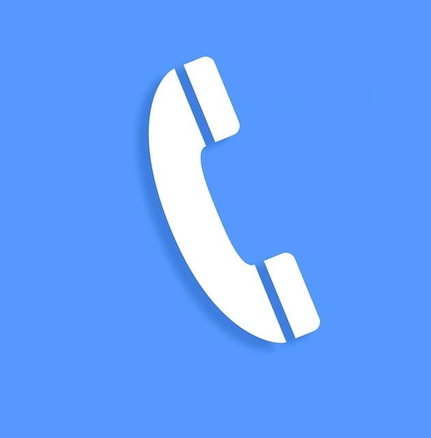 une icone de télephone fixe sur fond bleu